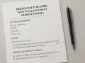 Protocole d'accord pour un licenciement transactionnel en France. Un stylo noir repose à côté du document.