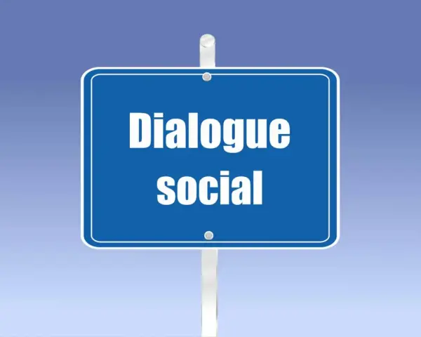 Panneau bleu indiquant "Dialogue social". Un résumé de la loi Rebsamen, axé sur le dialogue social.